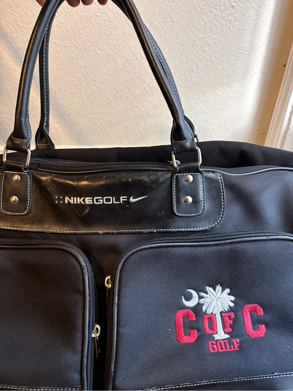 Nike Black Duffel Bag with Red Logo Accent